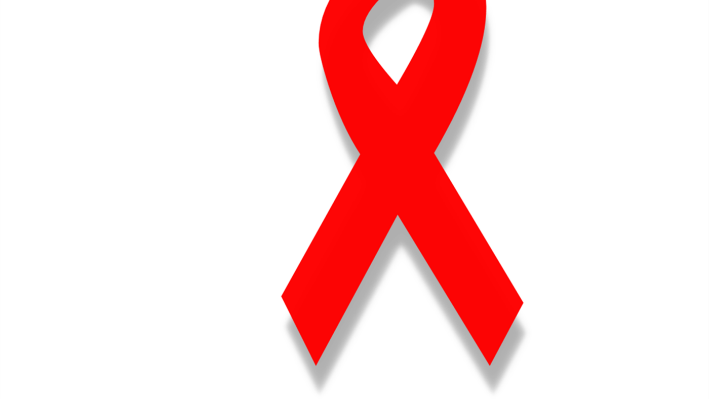 Diese Schleife gilt als Symbol für den Kampf gegen HIV und AIDS. Sie sagt: Wir lassen euch nicht alleine.